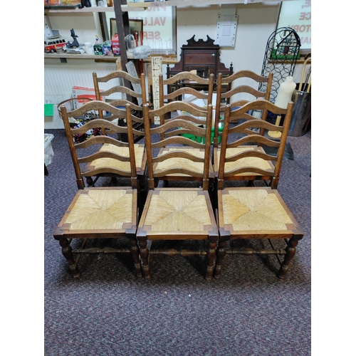 462 - A set of 6 antique ladder back woven rush seat chairs.