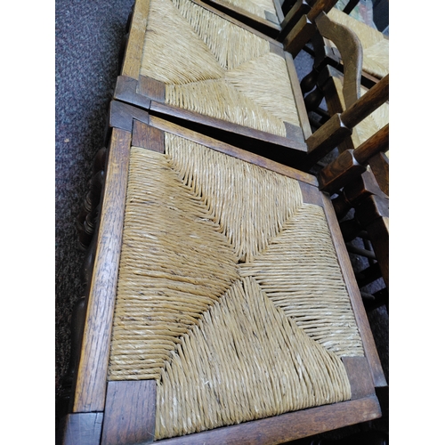 462 - A set of 6 antique ladder back woven rush seat chairs.