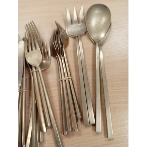 524 - 1950's Bronze set of six cutlery service and includes two sets of serving cutlery