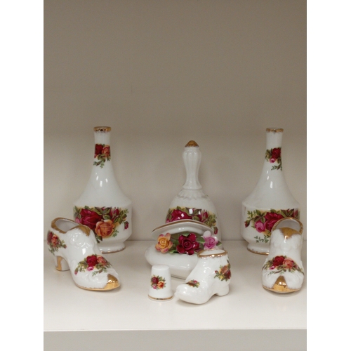 468 - Royal Albert Old country roses ceramics includes two posy vases, a bell, two shoes, a boot, a thimbl... 