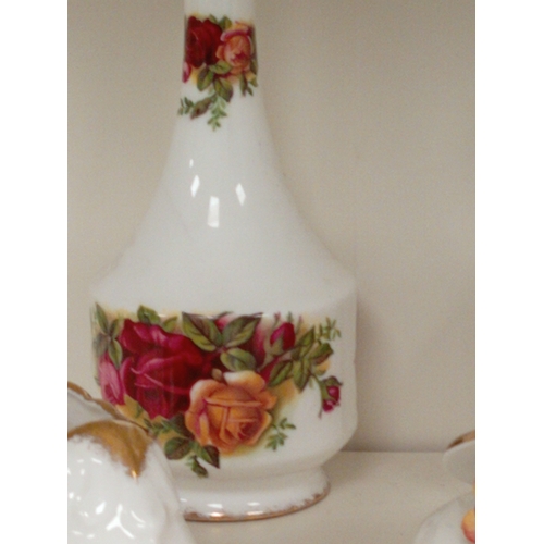 468 - Royal Albert Old country roses ceramics includes two posy vases, a bell, two shoes, a boot, a thimbl... 