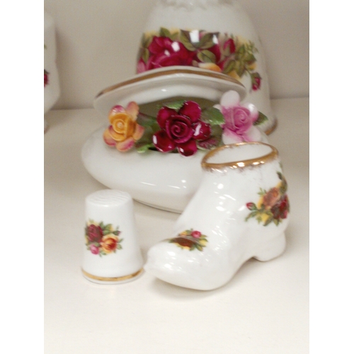 468 - Royal Albert Old country roses ceramics includes two posy vases, a bell, two shoes, a boot, a thimbl... 