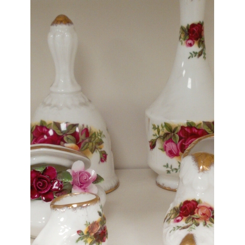 468 - Royal Albert Old country roses ceramics includes two posy vases, a bell, two shoes, a boot, a thimbl... 