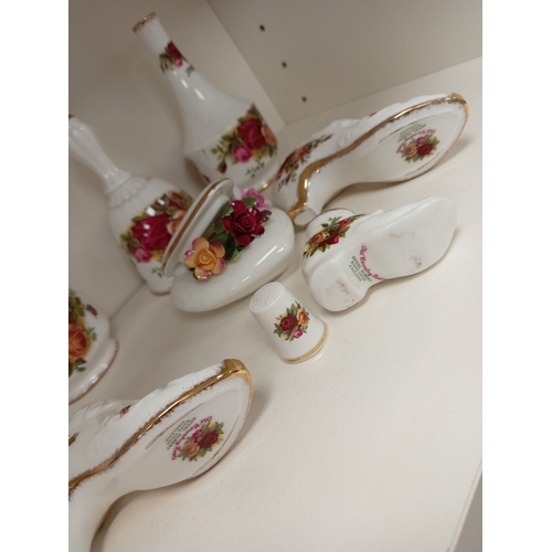 468 - Royal Albert Old country roses ceramics includes two posy vases, a bell, two shoes, a boot, a thimbl... 