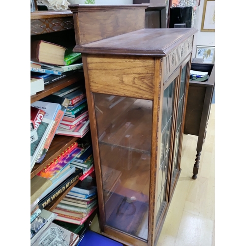 475 - Glass and lead framed display cabinet. H 124cm x W 75cm x D 34cm