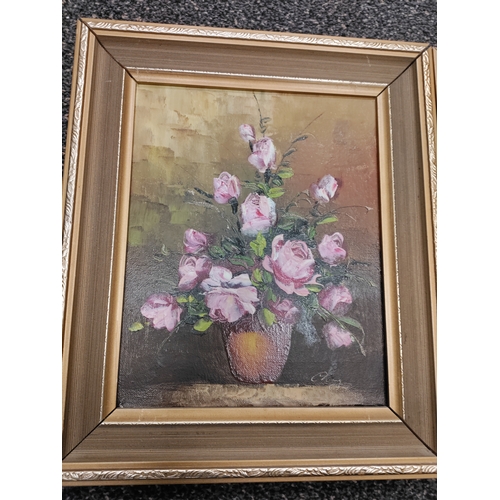 481 - A trio of matching frame signed oil paintings of flowers. Two frames need a little attention. H 34cm... 