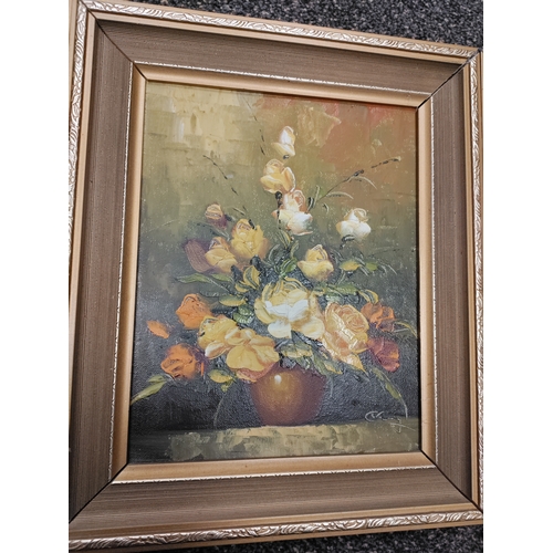 481 - A trio of matching frame signed oil paintings of flowers. Two frames need a little attention. H 34cm... 