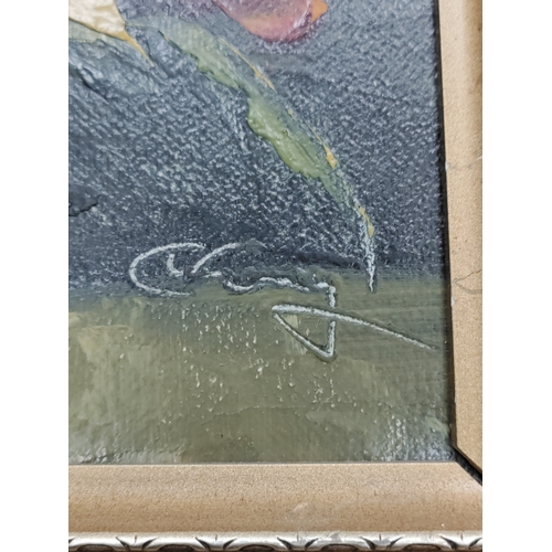 481 - A trio of matching frame signed oil paintings of flowers. Two frames need a little attention. H 34cm... 