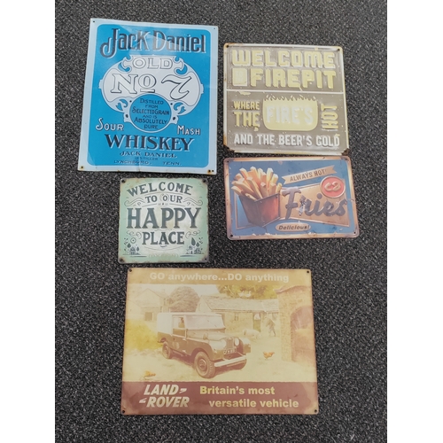 486 - A job lot of 5 tin signs. To include land rover, Jack Daniels and more.