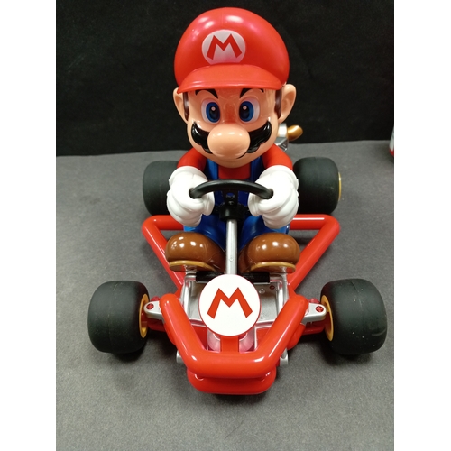 553 - Carrera Super Mario Kart RC Vehicle without remote control. H 15cm x L 18cm x W 15cm