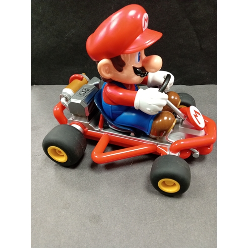 553 - Carrera Super Mario Kart RC Vehicle without remote control. H 15cm x L 18cm x W 15cm