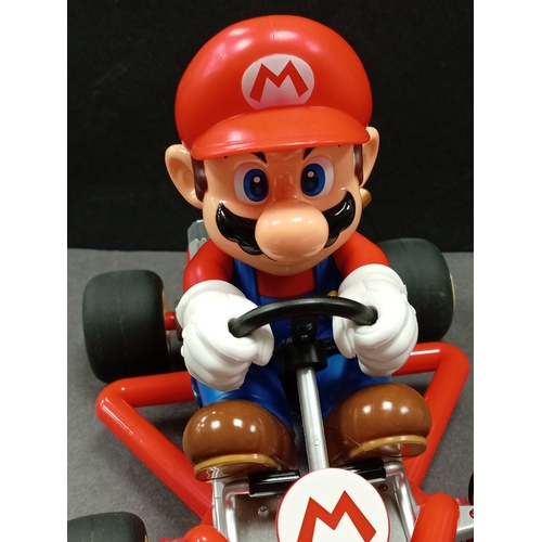 553 - Carrera Super Mario Kart RC Vehicle without remote control. H 15cm x L 18cm x W 15cm