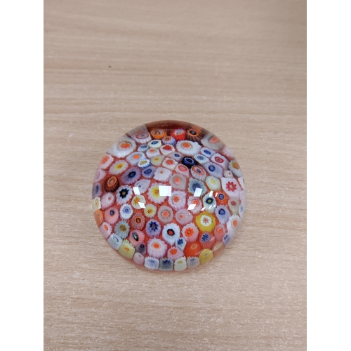 554 - A vintage strathearn multi colour millefiori paper weight hand made in Scotland.