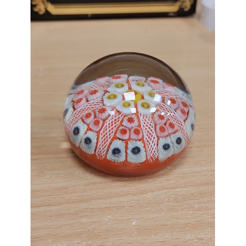 559 - A vintage strathearn millefiori red, yellow, blue and white paper weight hand made in Scotland.