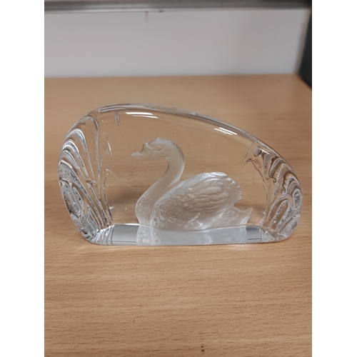 567 - A glass swan signed made in Sweden, a etched glass swan and a glass duck.