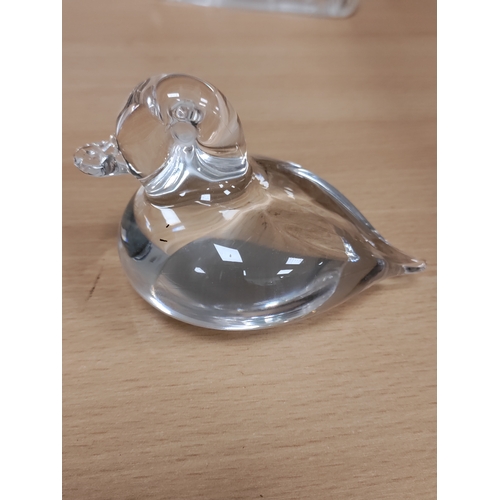 567 - A glass swan signed made in Sweden, a etched glass swan and a glass duck.