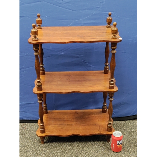 576 - Antique mahogany three tier shelf whatnot. Missing a foot