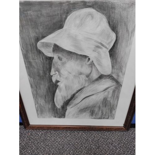 589 - A signed pencil drawing of a fisherman.