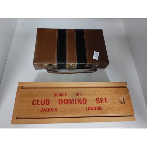 491 - Two domino sets. One folds into little bag and the other is a sliding top dovetail box