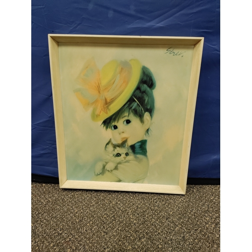 601 - A 1960s polkerris products print of a young girl in a hat holding a cat.