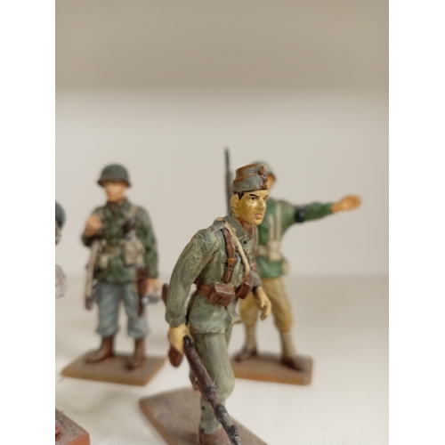 620 - Ten die cast delprado lead soldier figures with magazines includes Corporal, Trooper, warrant office... 