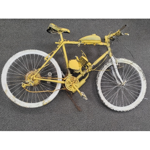 598 - A pedal bike which has been converted to petrol and partially sprayed yellow. AF