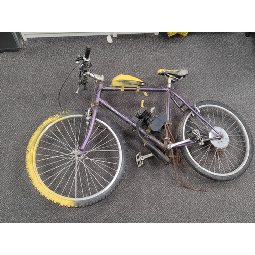 598 - A pedal bike which has been converted to petrol and partially sprayed yellow. AF