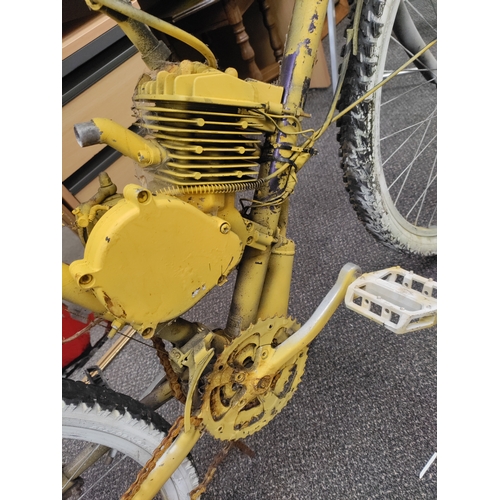 598 - A pedal bike which has been converted to petrol and partially sprayed yellow. AF