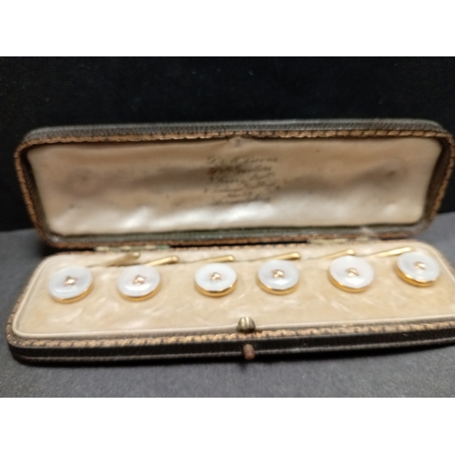 759 - Antique Edwardian 18ct gold mother of pearl detail buttons in original case. Weight 9.52 grams