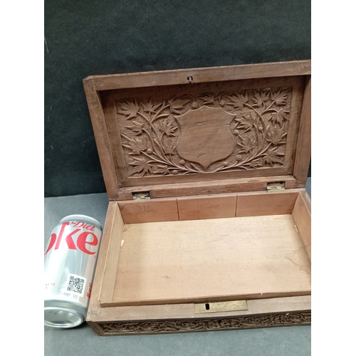 480 - Carved indian wood jewellery box H 6.5cm x W 27cm.