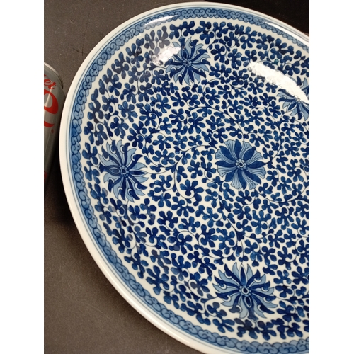 482 - Decorative blue and white Oriental dish 33cm diameter.