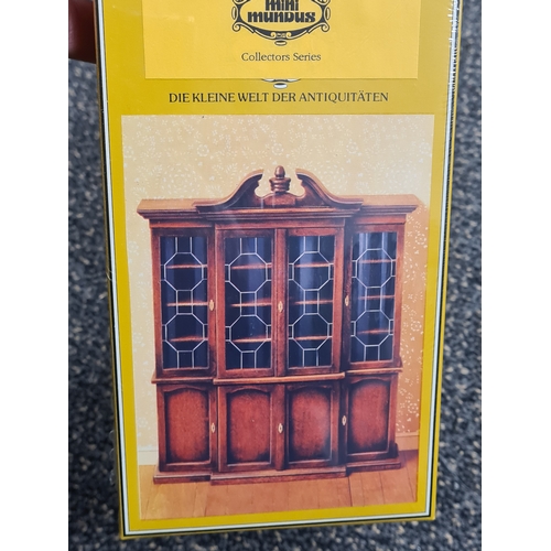 483 - 4 Miniature Chippingdale wooden Dolls House Kits, Authentic Furniture to include Breakfront Bookcase... 