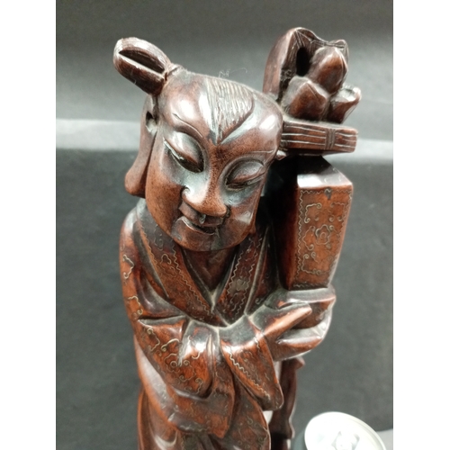 491 - Antique Chinese wooden immortal figure with silver inlay. Circa 1920.H 37cm x W 10cm.