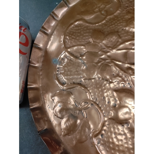 492 - Arts and crafts copper tray 32cm diameter.