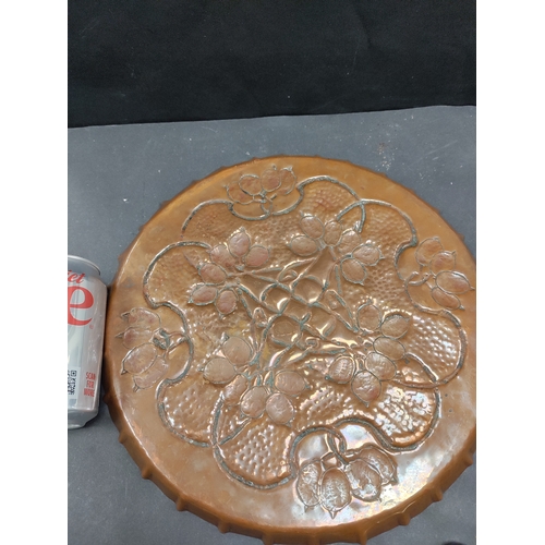 492 - Arts and crafts copper tray 32cm diameter.