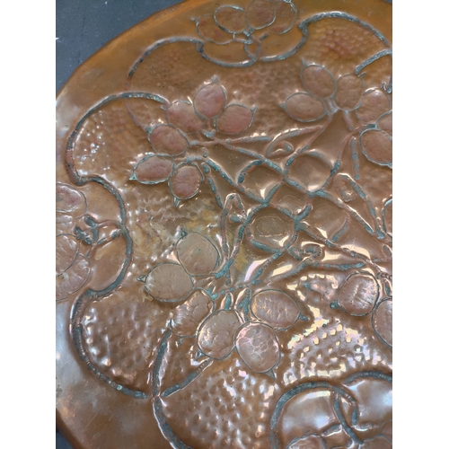 492 - Arts and crafts copper tray 32cm diameter.