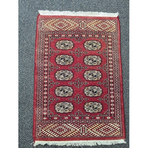 500 - Vintage Red Patterned Persian Rug. Measures 95cm x 64cm.