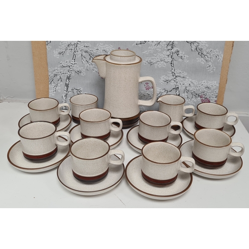 512 - Denby stoneware coffee set to include coffee pot, milk jug, sugar bowl and 8 cups with saucers.