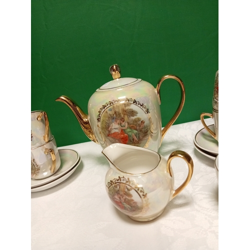 516 - Ornate foreign porcelain coffee service, this consists of six cups, saucers, coffee pot, sugar bowl ... 