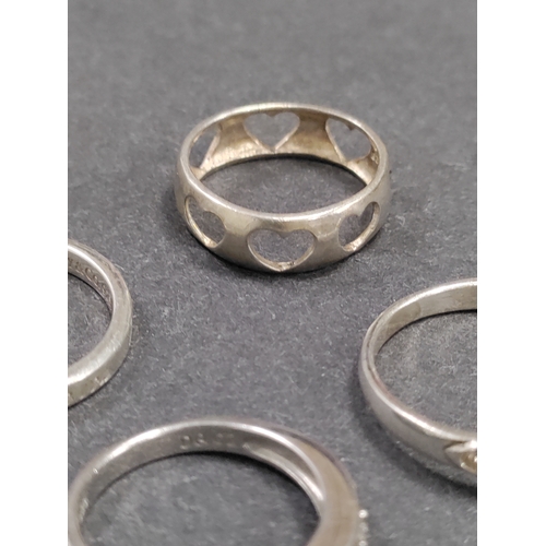 733 - A job lot of 4 925 silver rings. To include an I love you ring stamped Tiffany & Co, a celtic ring w... 