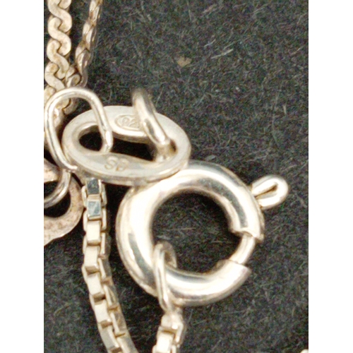 718 - Three 925 silver chains with 925 silver pendants includes modernist single stone pendant, Taurus zod... 