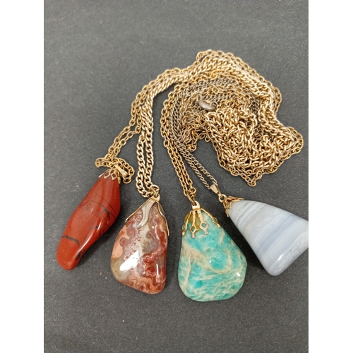 744 - Four vintage Agate stone pendants on chains.