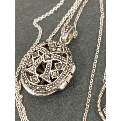 754 - Three 925 silver chains with pendants includes marcasite locket pendant, rennie macintosh pendant an... 