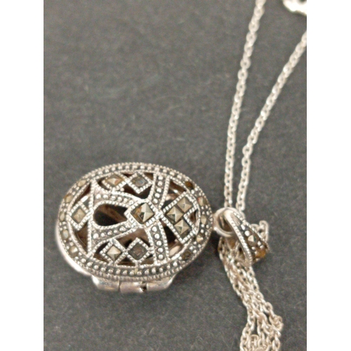 754 - Three 925 silver chains with pendants includes marcasite locket pendant, rennie macintosh pendant an... 