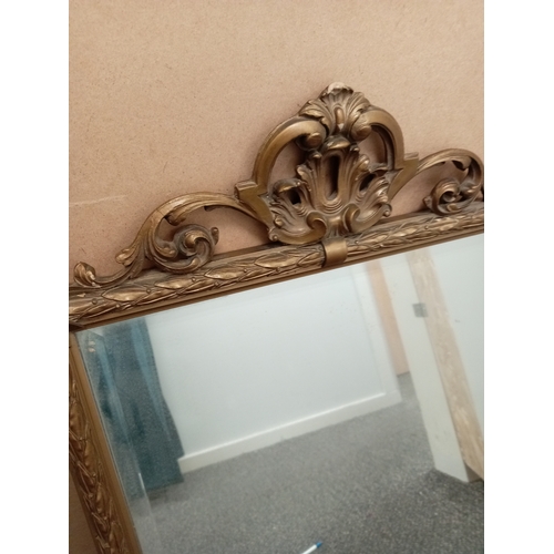 478 - Ornate gold framed bevelled mirror. H 79cm x W 39cm.