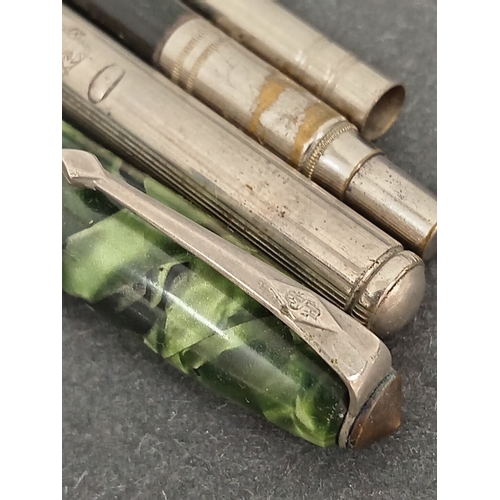 650 - Conway Stewart Green marbled 14ct gold nibbed pen and three propelling pens/pencils.