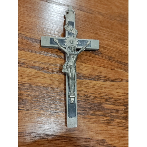 656 - A trio of wood/metal crucifixes. One is believed to be silver.