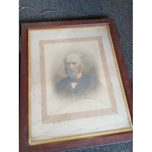 533 - Victorian pair of photographs in large wooden frames. H 67cm x W 55cm. One A/F damage to glass.