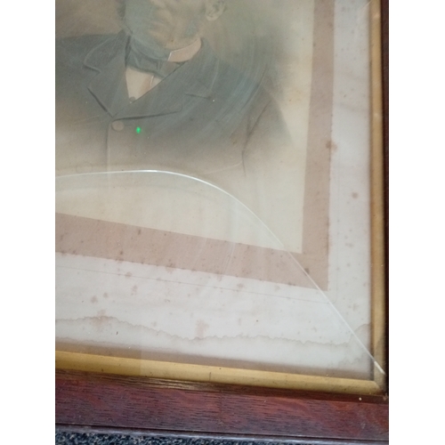 533 - Victorian pair of photographs in large wooden frames. H 67cm x W 55cm. One A/F damage to glass.