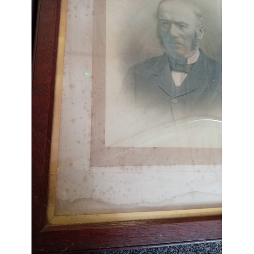 533 - Victorian pair of photographs in large wooden frames. H 67cm x W 55cm. One A/F damage to glass.